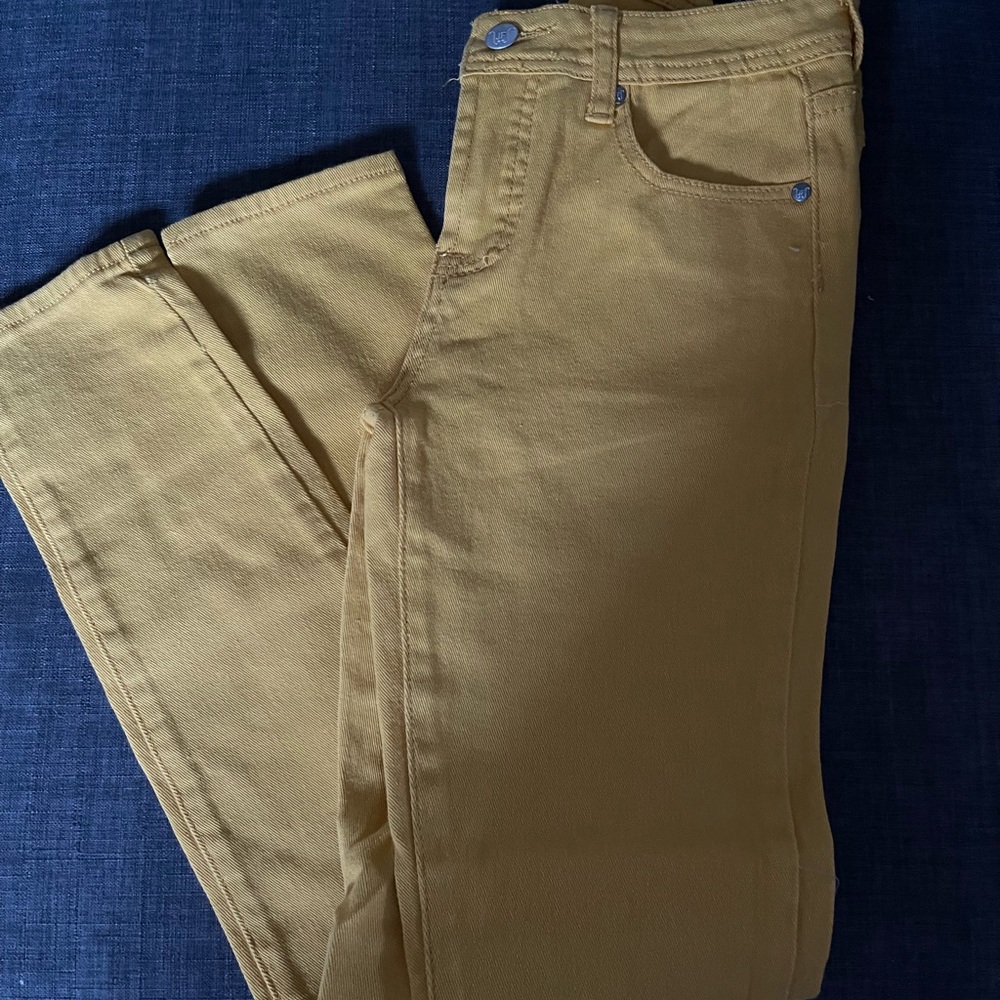 Woman mustard colored jeans